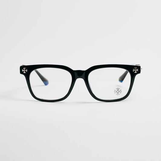 Black eyeglasses with decorative elements on a light gray background