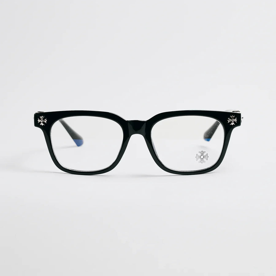 Black eyeglasses with decorative elements on a light gray background